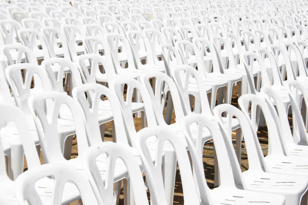 maintaining white plastic chairs